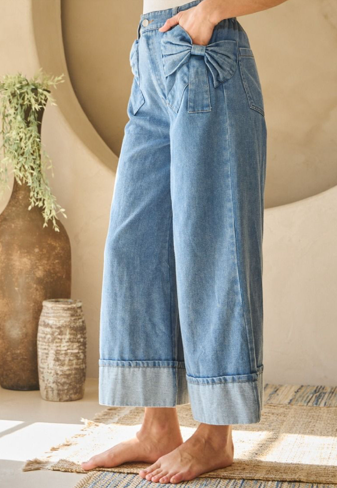 Washed denim wide leg denim pants with bow detailed pocket