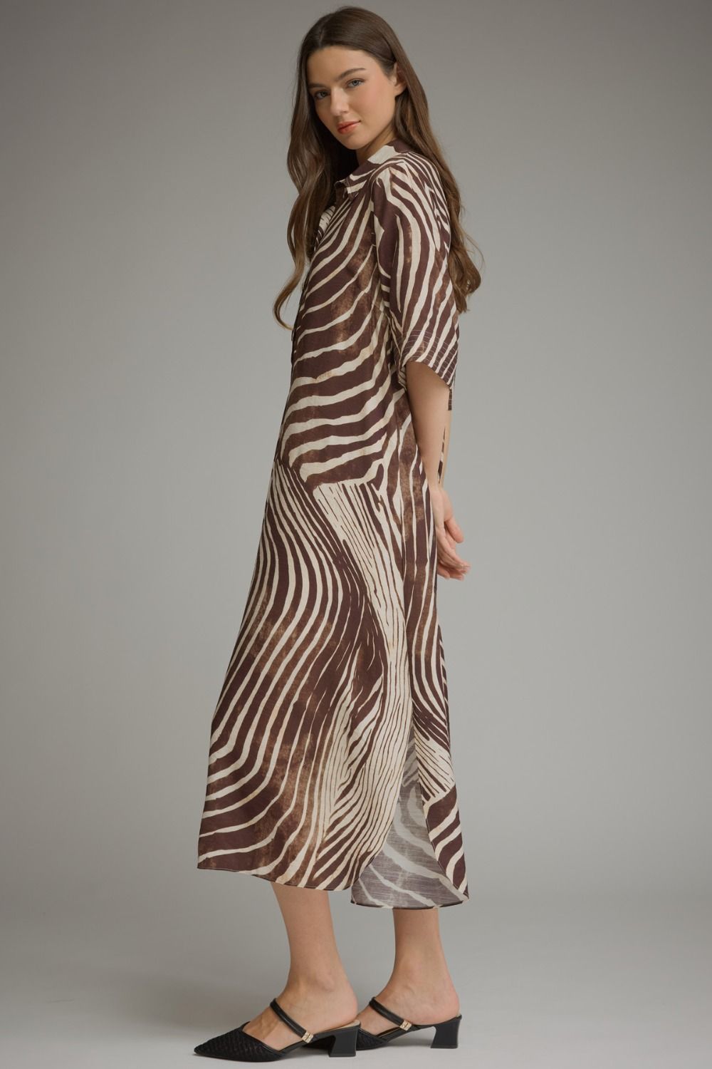 Entro- Abstract zebra print elbow sleeve midi dress featuring a split neckline