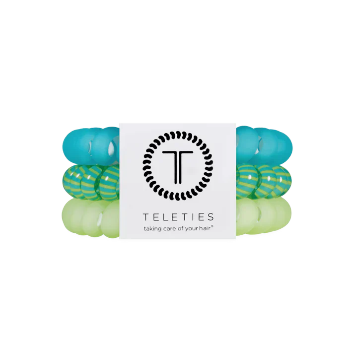 3 hairties in a set. One blue, one green, and one striped