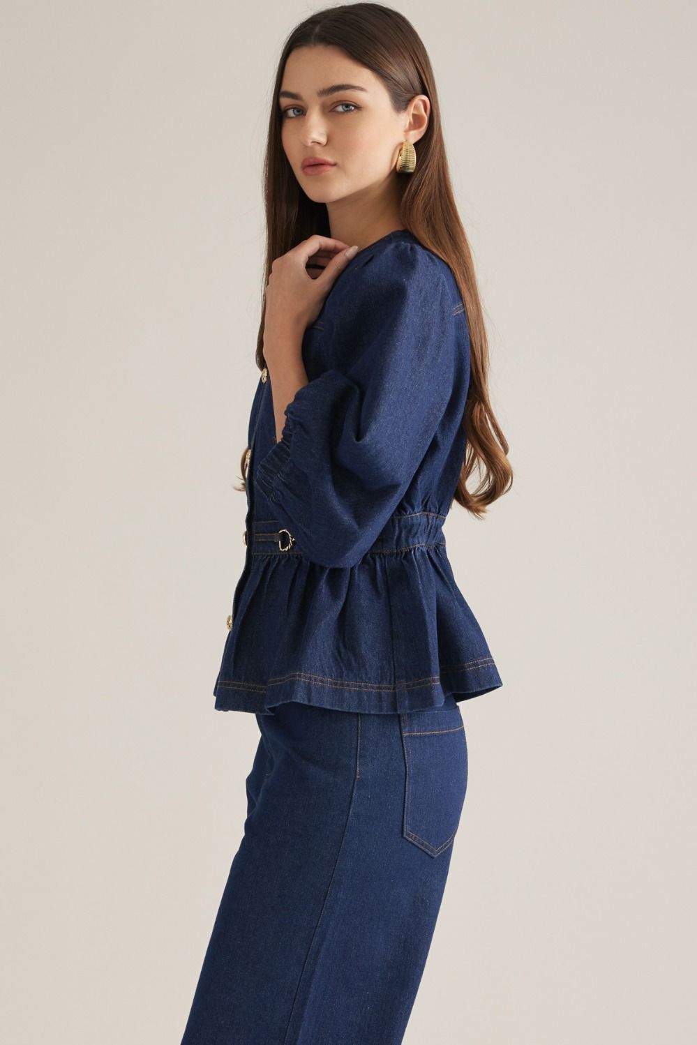 Entro-Solid ¾ puff sleeve denim top with round neckline and button closure at front