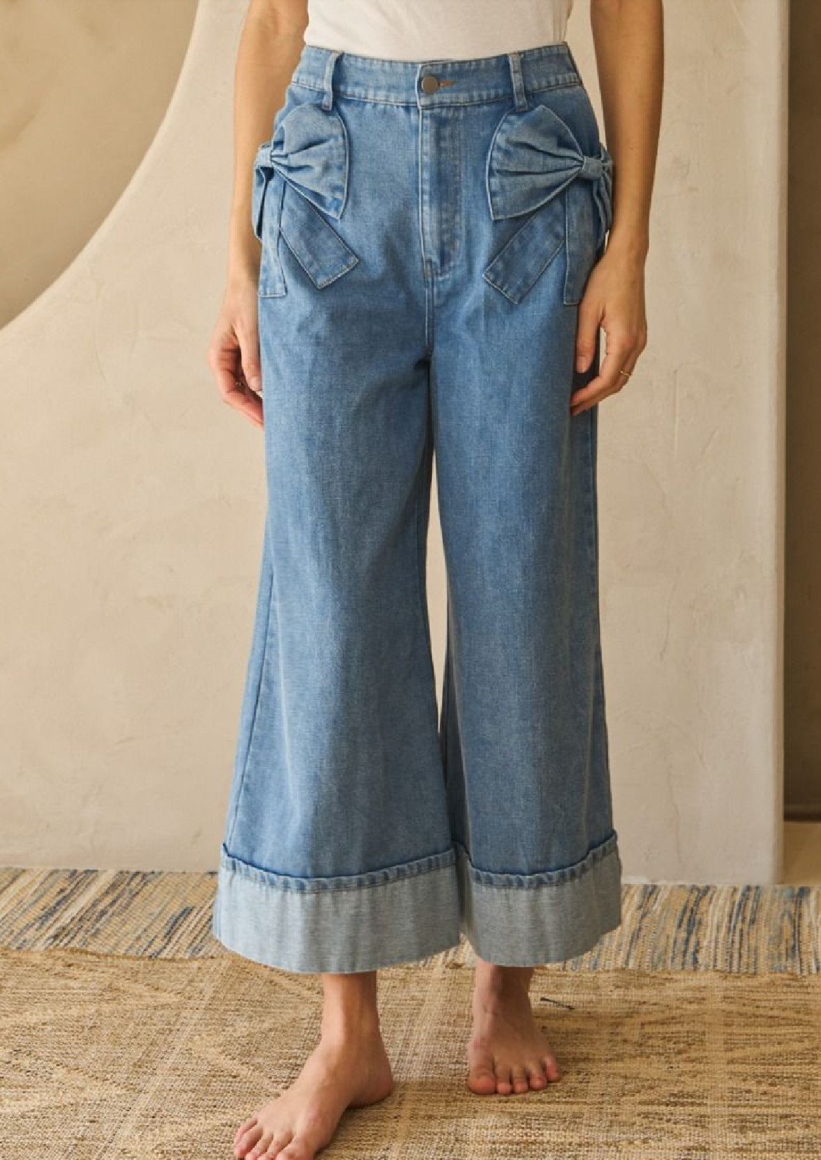 Washed denim wide leg denim pants with bow detailed pocket