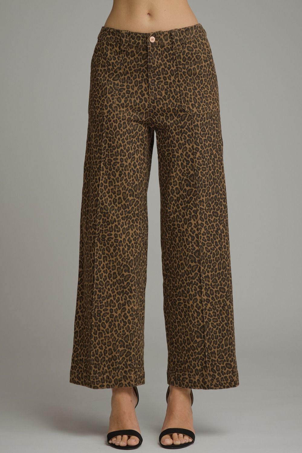 Entro- Animal print wide leg pants with belt loops and zip-fly button front closure. Front patch pockets