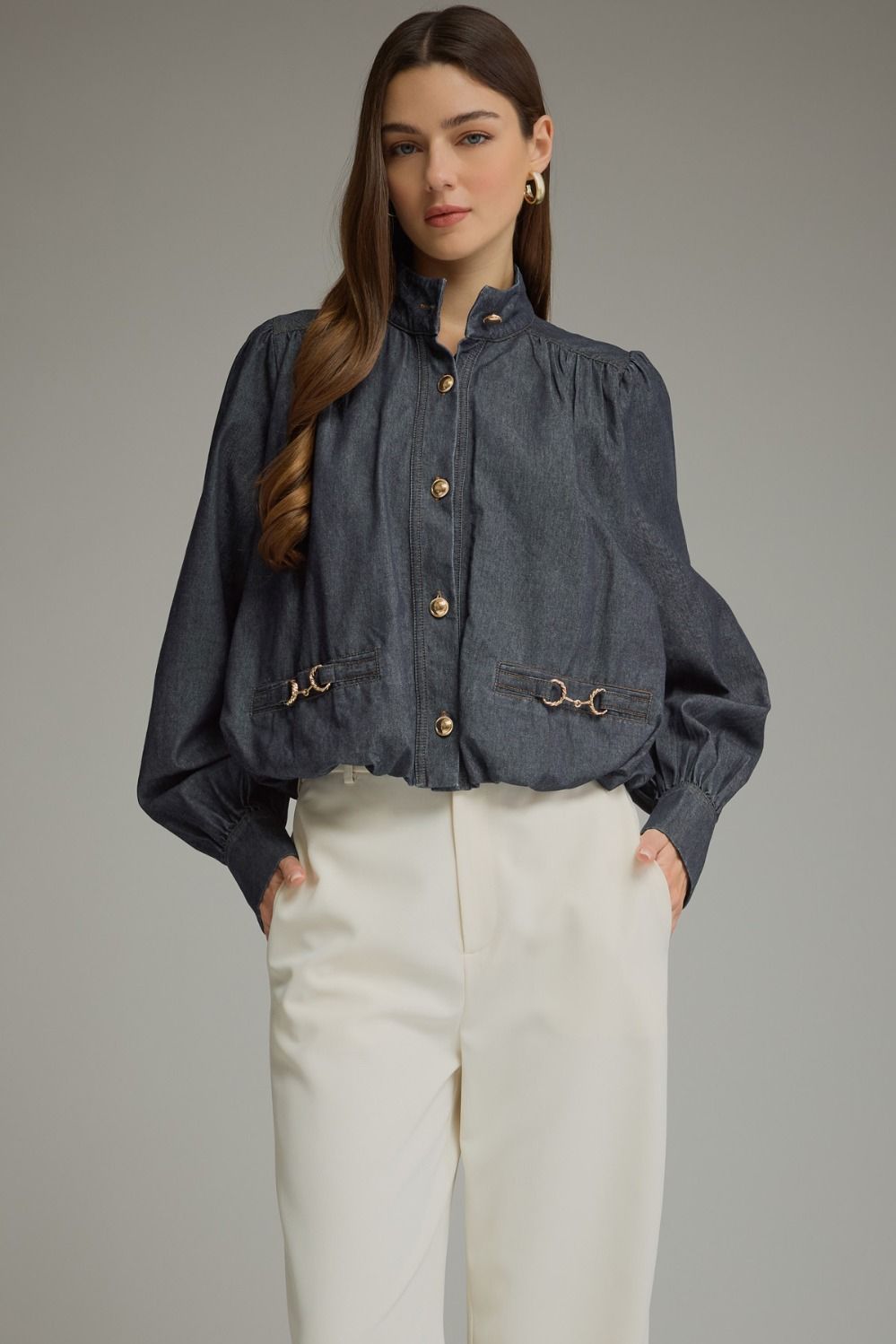 Entro-Solid long sleeve denim top with a high neckline and button closure at front