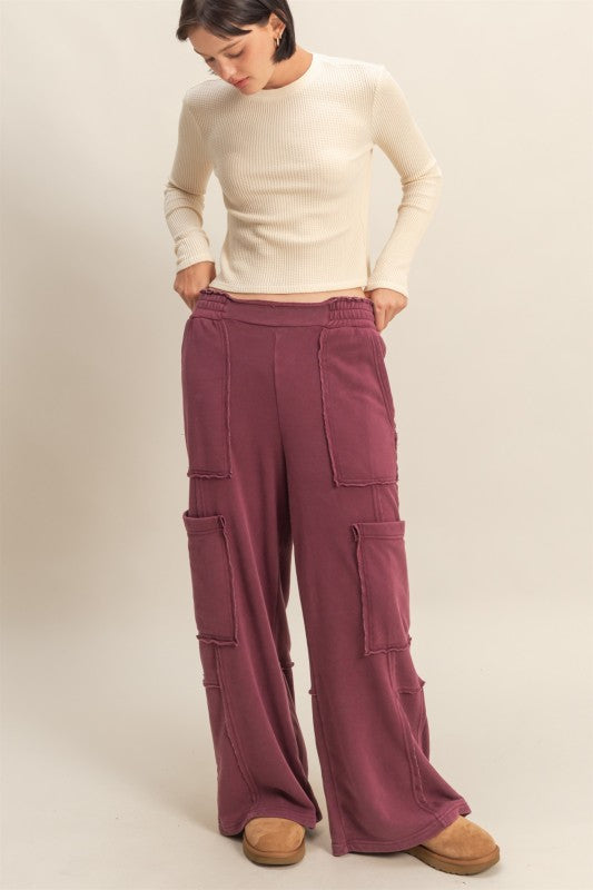 Utility sweatpants styled with crop top and sweater