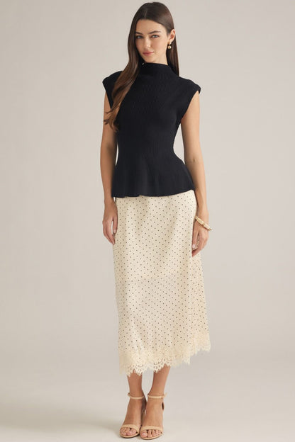 Entro-Solid cap sleeve knit top with a mock neck.