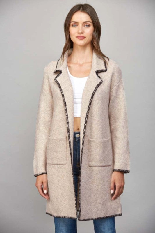 Open-front knit cardigan with whipstitch detailing