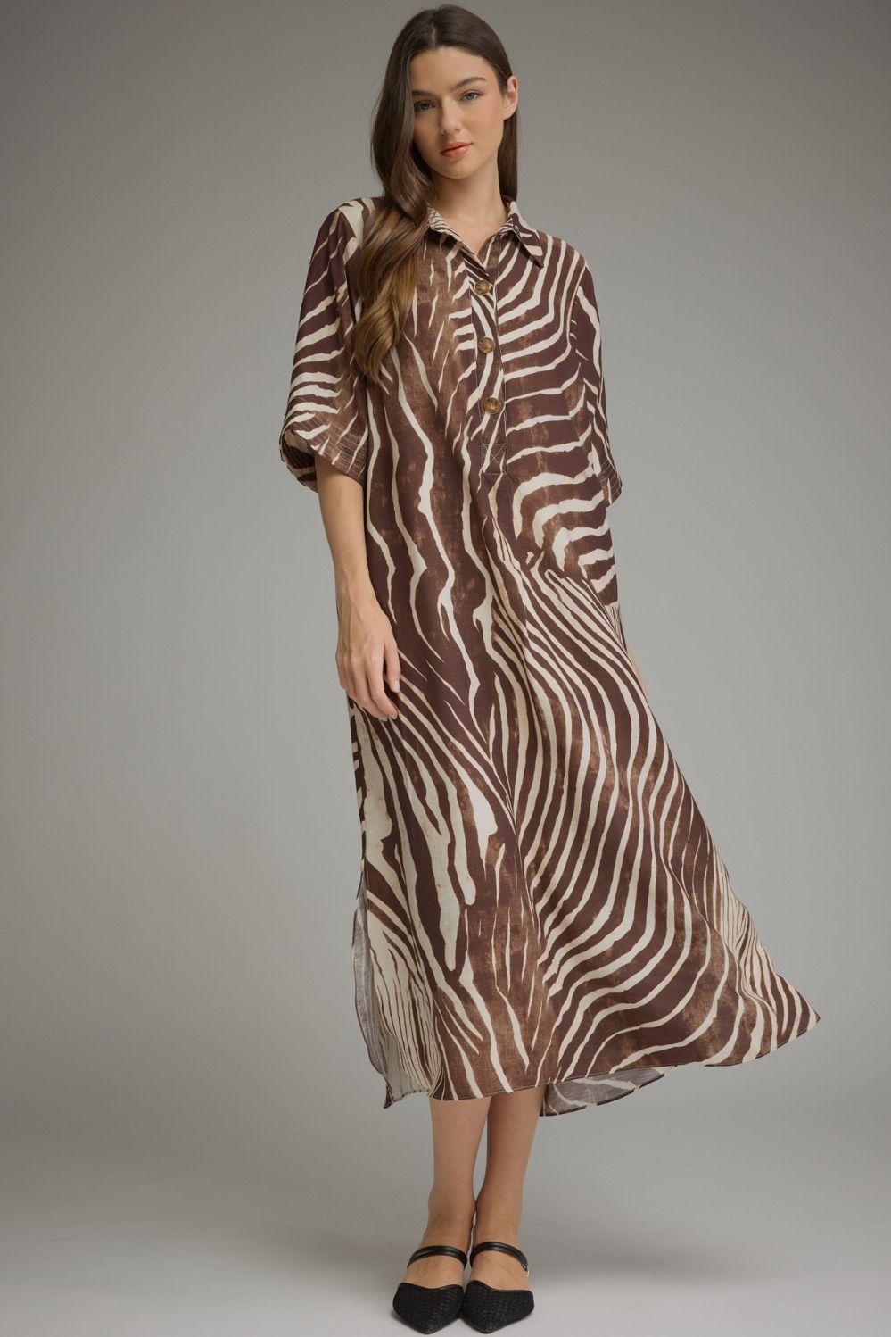 Entro- Abstract zebra print elbow sleeve midi dress featuring a split neckline