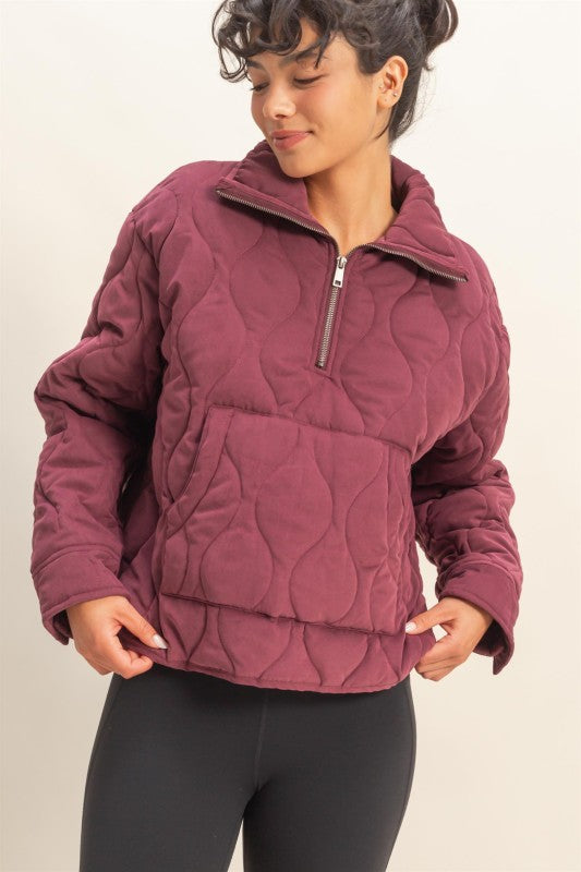Front view of quilted zip front pullover in casual relaxed fit