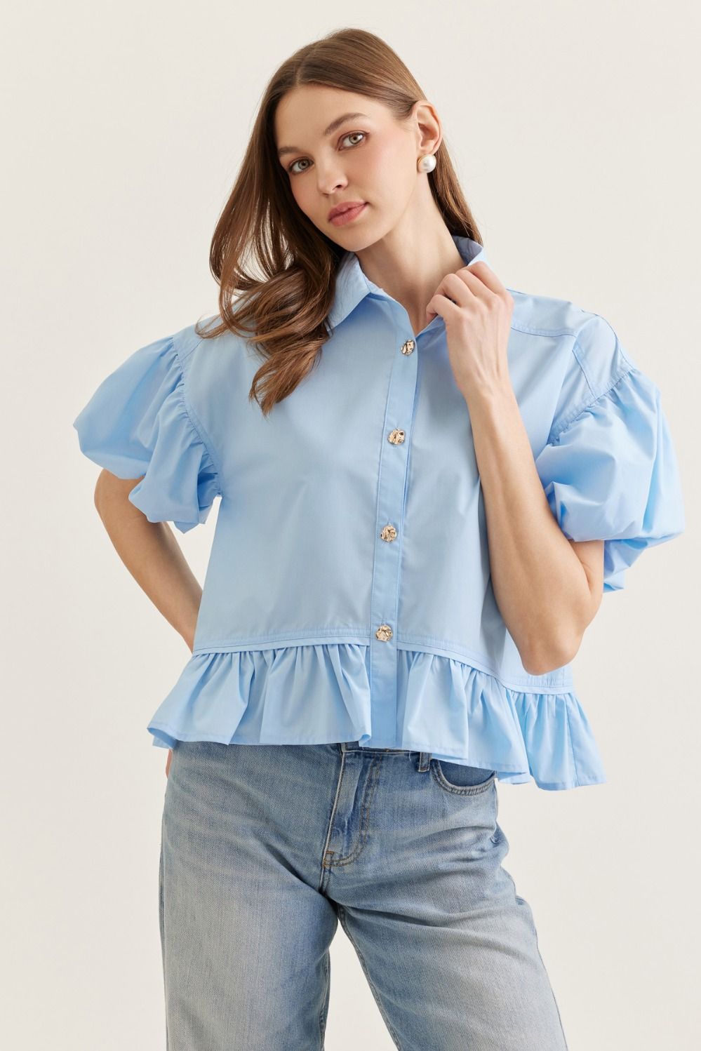 Entro Solid short puff sleeve top featuring ruffle hem detail.