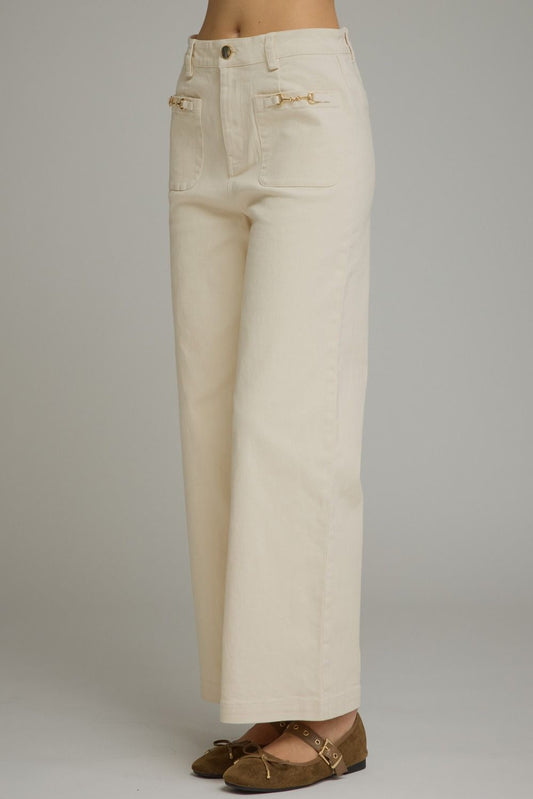 Entro-Solid wide leg pants featuring a zip-fly button front closure. Front patch pockets with hardware accent. Decorative back welt pockets. Belt loops.