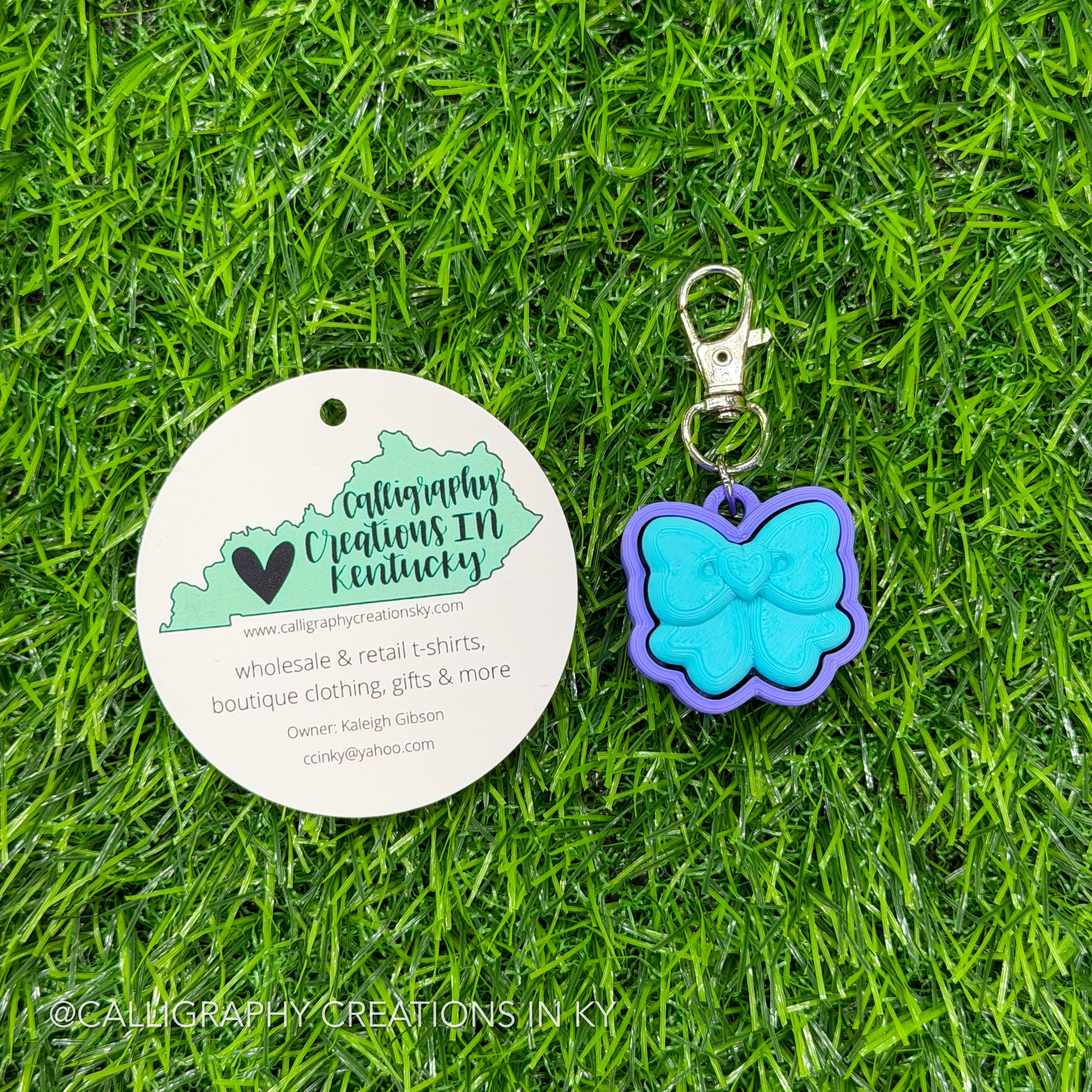 Turquoise/Purple Bow Fidget Clicker Keychain