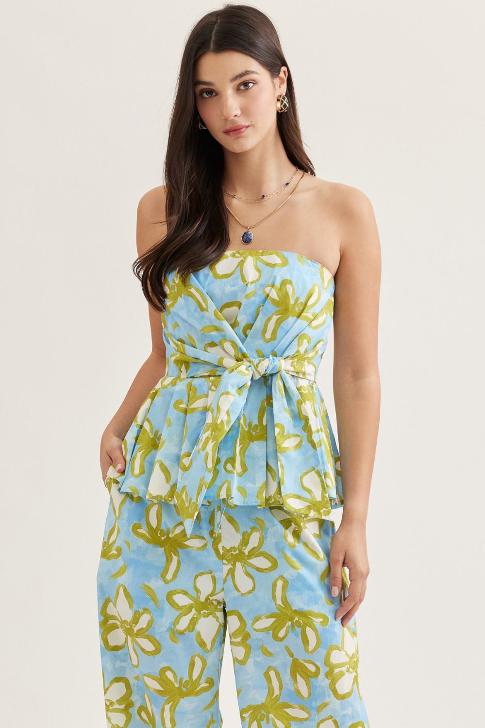Entro Floral strapless peplum top with matching pants.