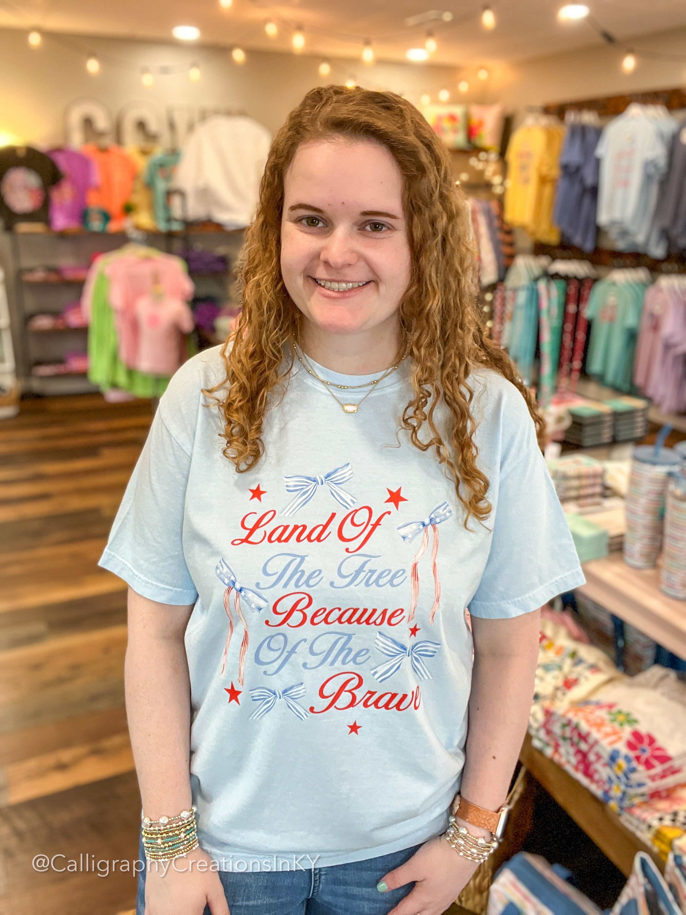 Land Of The Free Bows CC Tee