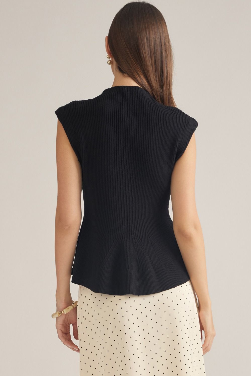 Entro-Solid cap sleeve knit top with a mock neck.