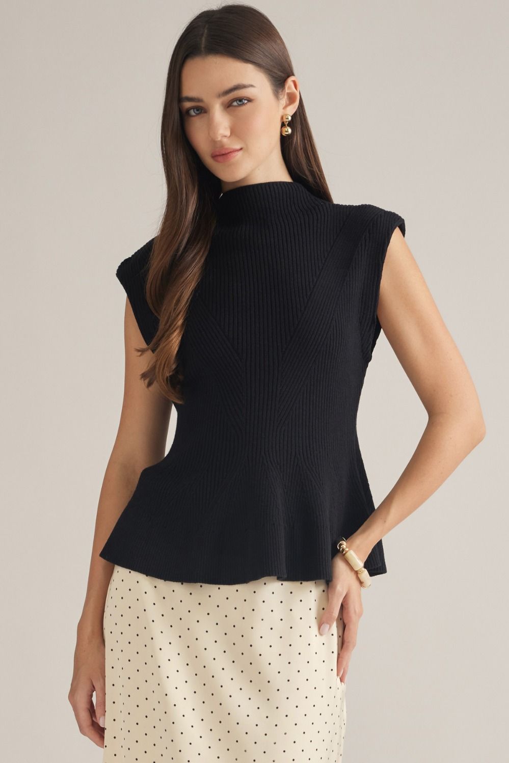 Entro-Solid cap sleeve knit top with a mock neck.