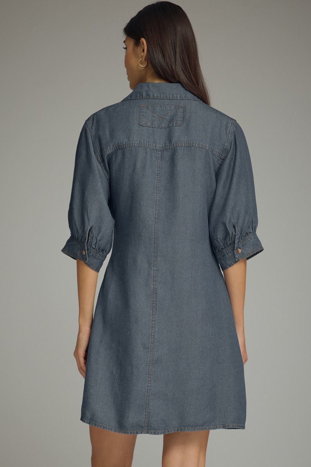 Entro-Solid ¾ sleeve denim mini dress featuring self-tie waist detail.
