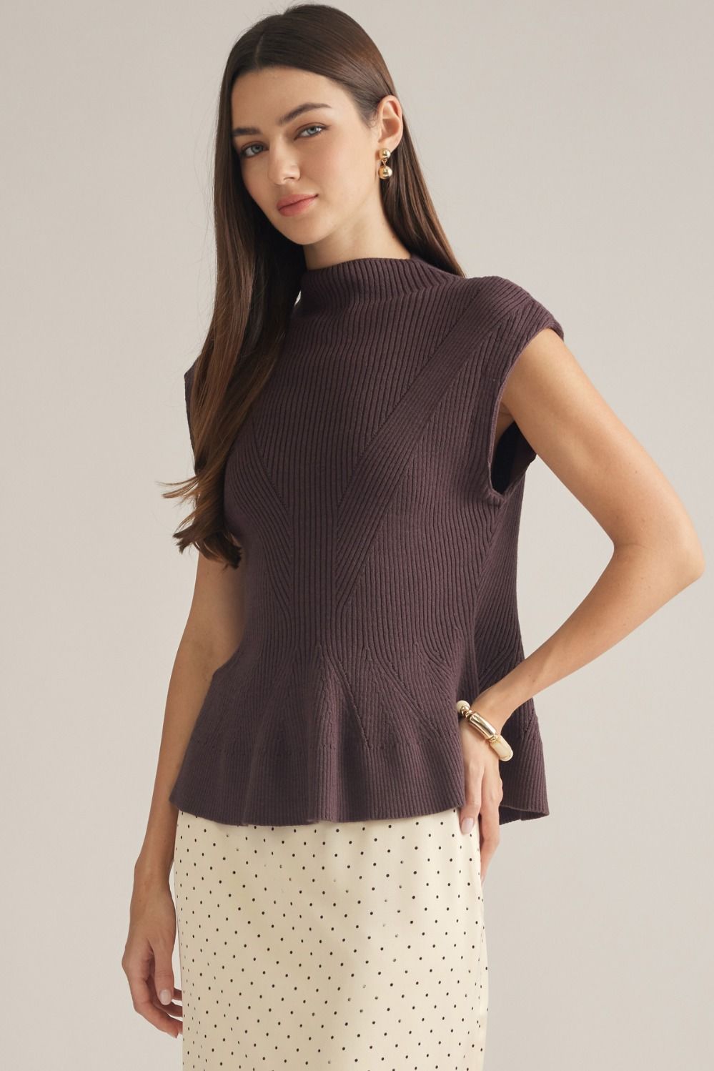 Entro-Solid cap sleeve knit top with a mock neck.