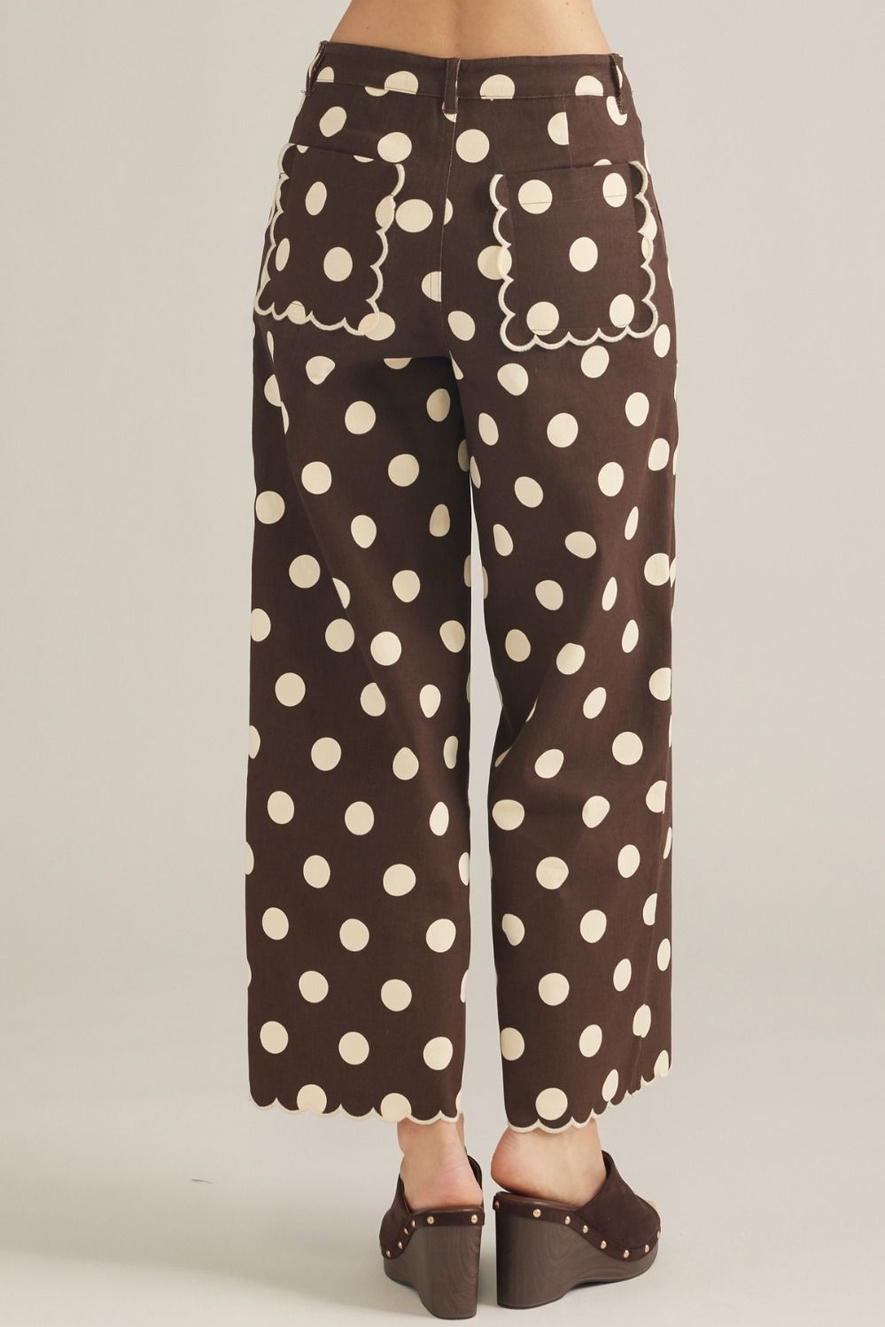 Entro-Polka dot wide leg pants featuring scallop trim.