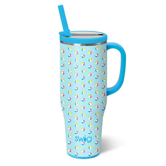 Blue tumbler with beach ball pattern and straw on a white background