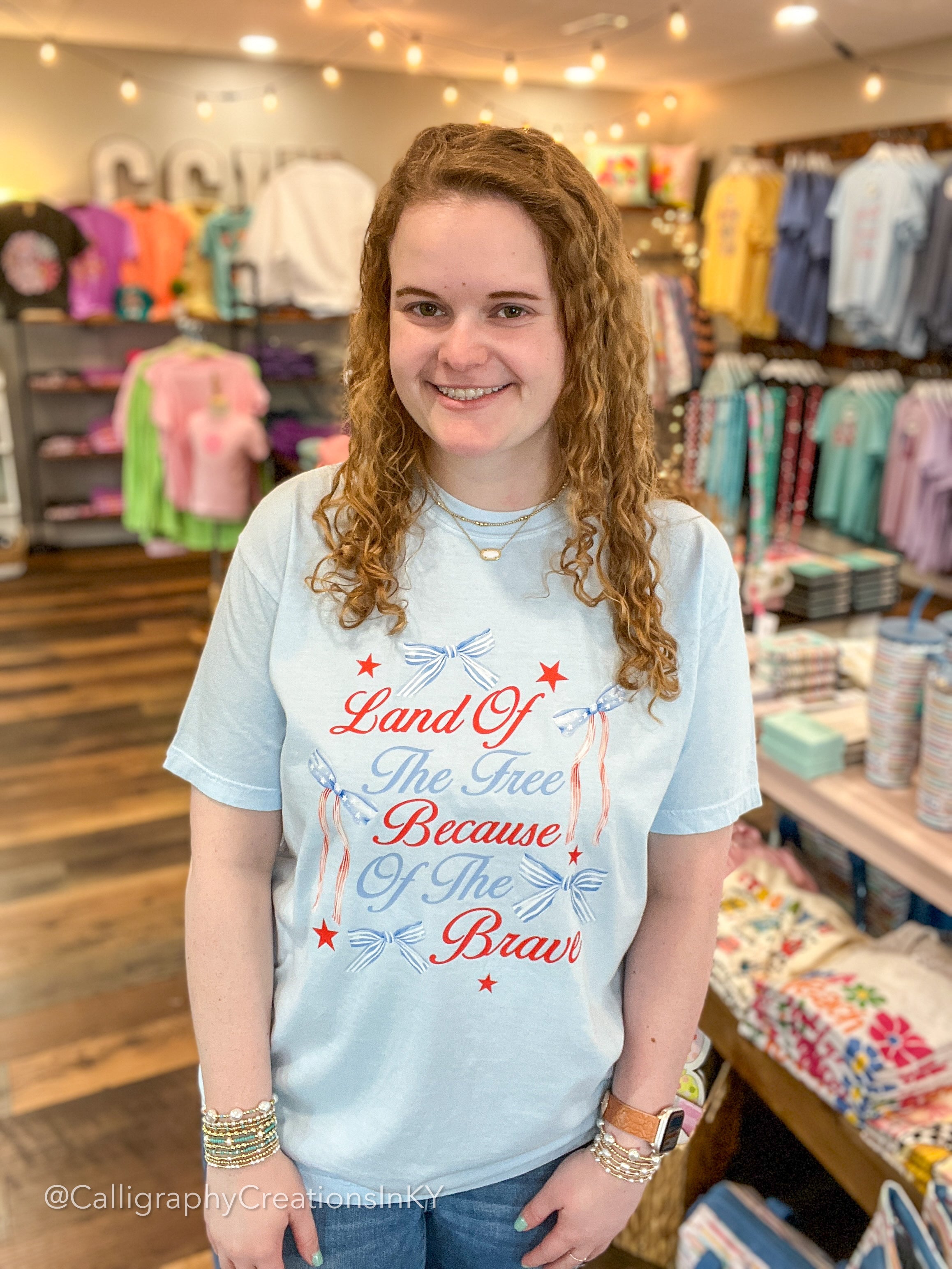 Land Of The Free Bows CC Tee