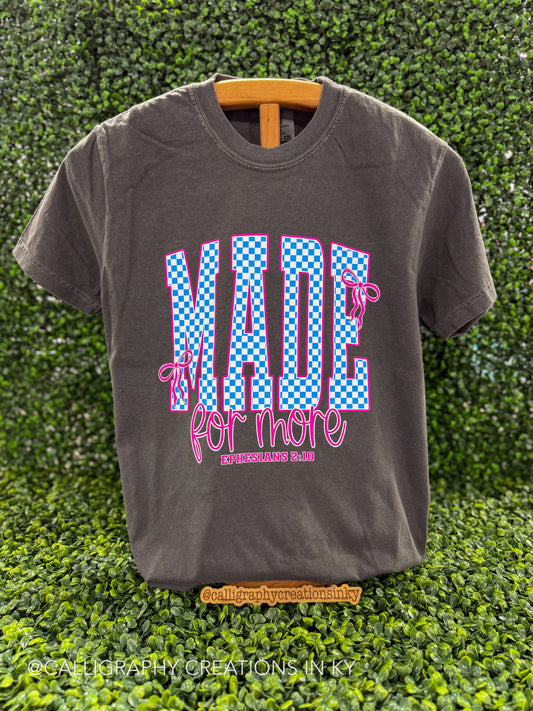 Gray tee that says “Made For More”