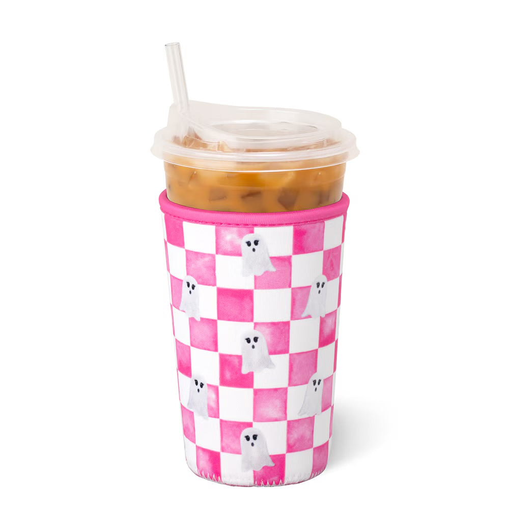 A cup sleeve on a clear plastic cup with a straw, filled with iced coffee, on a white background.