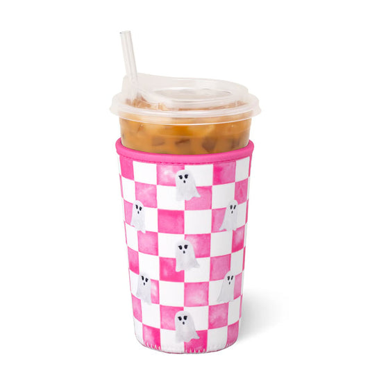 A cup sleeve on a clear plastic cup with a straw, filled with iced coffee, on a white background.