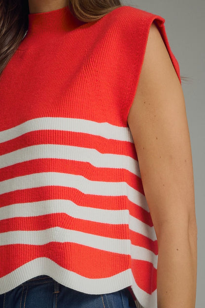 Entro-Stripe mock neck sleeveless sweater knit top featuring scallop hem.