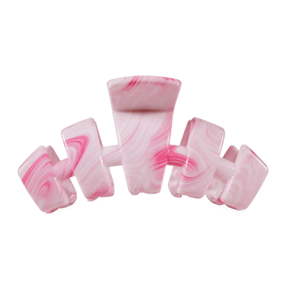 Pink and white marbled claw clip on a white background