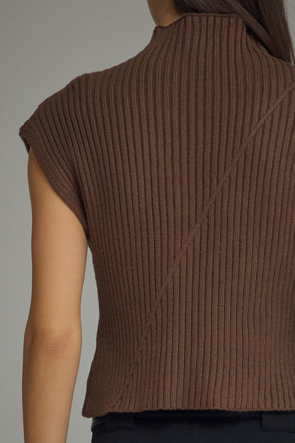 Entro-Solid cap sleeve knit top featuring ribbed texture. Mock neckline. Diagonal seam detail at front and back.