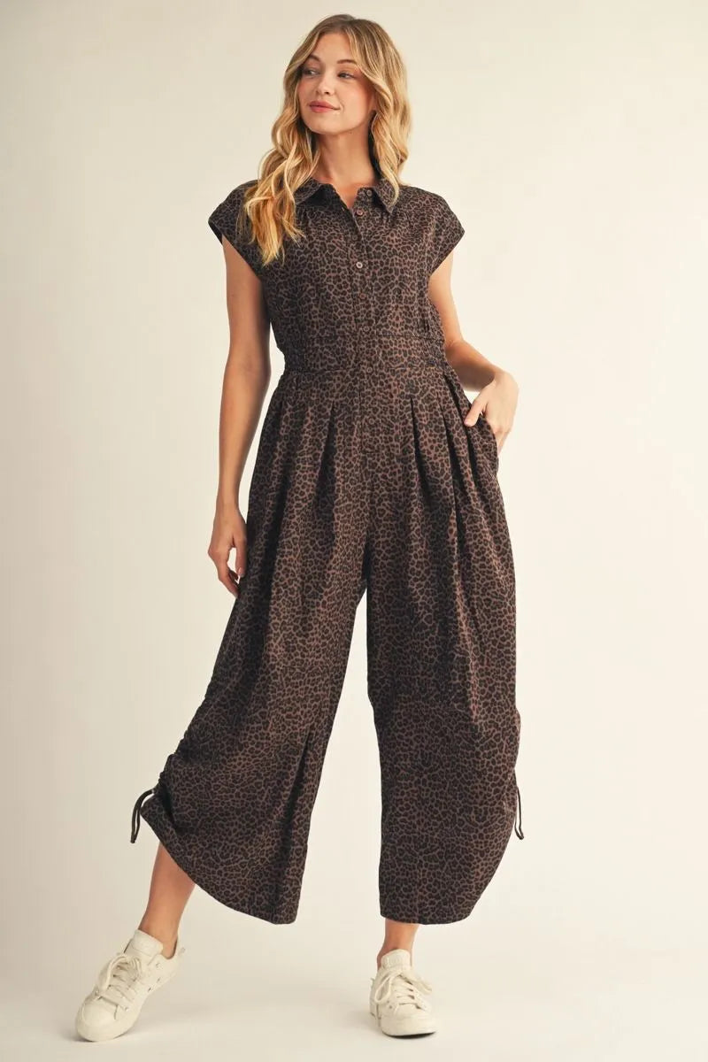 Jodifl-Drop shoulder button down wide leg leopard jumpsuit with side drawstring hem accent, front pleat detail, side pockets.