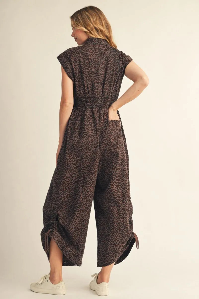 Jodifl-Drop shoulder button down wide leg leopard jumpsuit with side drawstring hem accent, front pleat detail, side pockets.