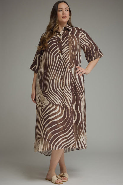 Entro-Plus Size Abstract zebra print elbow sleeve midi dress featuring a split neckline with button closure at front. Side pockets. High-low hem.
