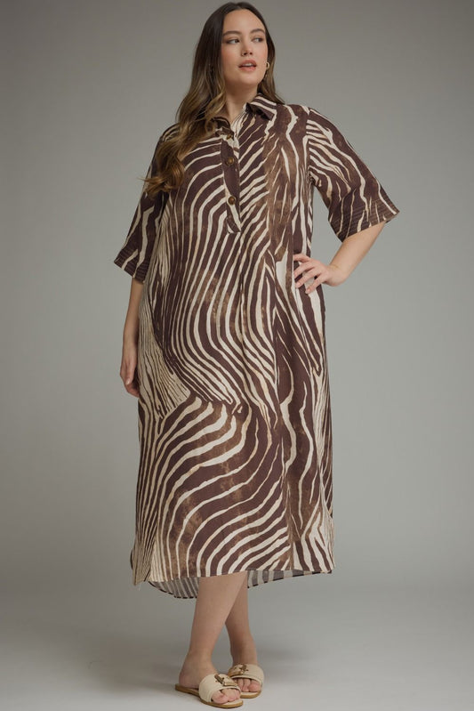 Entro-Plus Size Abstract zebra print elbow sleeve midi dress featuring a split neckline with button closure at front. Side pockets. High-low hem.