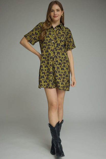 Entro-Butterfly print short sleeve mini dress featuring a button closure at front and chest pocket. Side pockets.