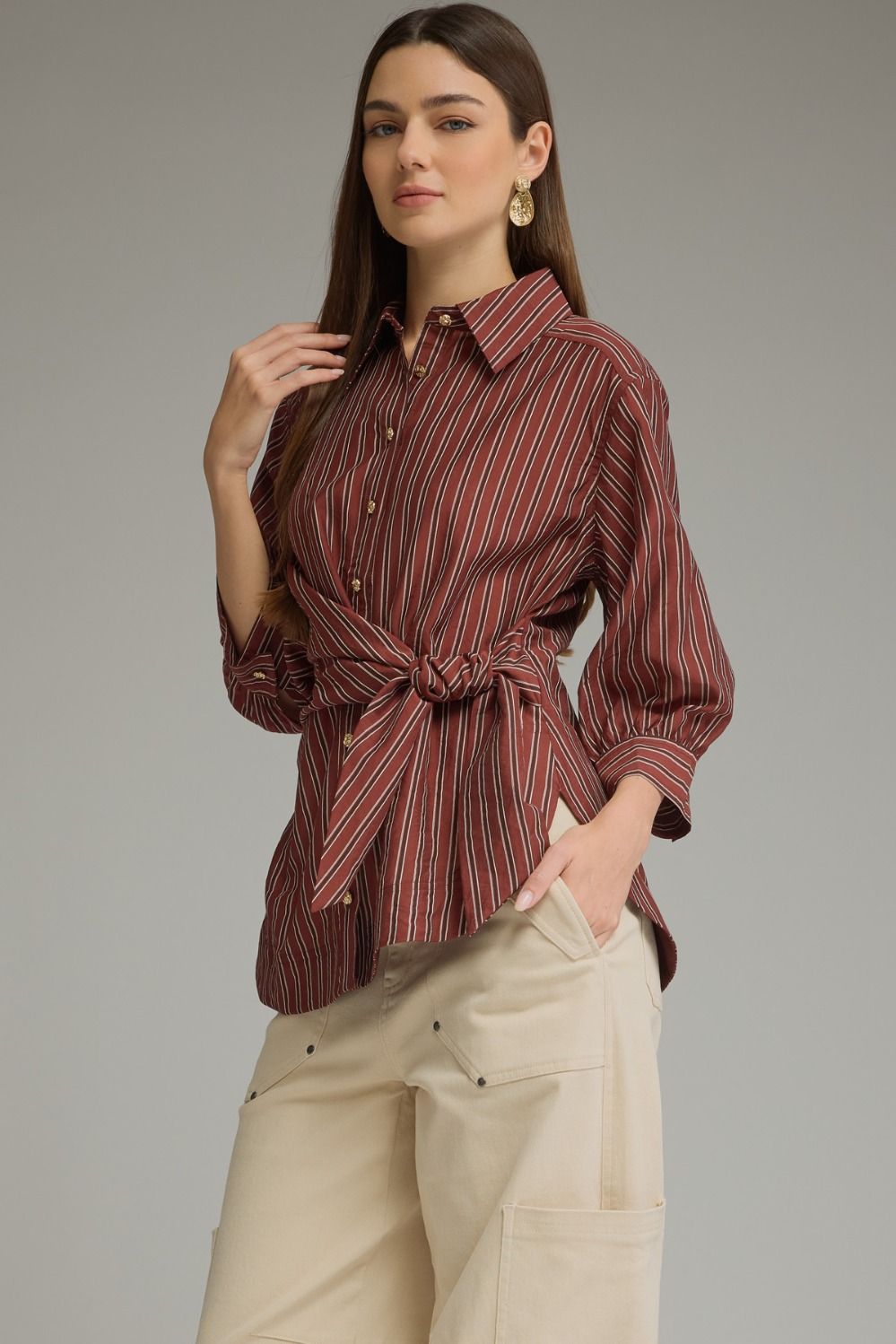 Entro-Stripe print ¾ puff sleeve top with a front waist tie.