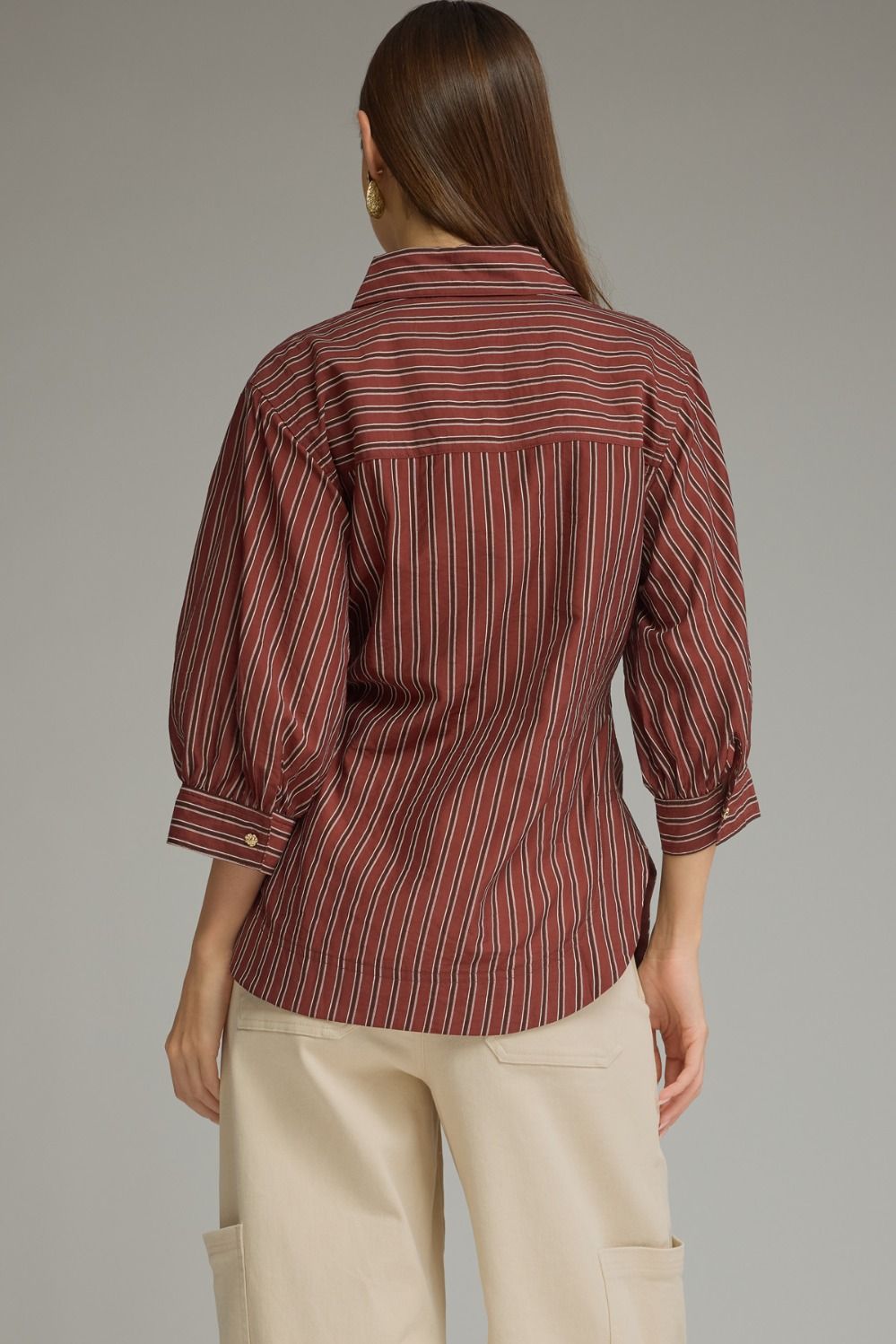 Entro-Stripe print ¾ puff sleeve top with a front waist tie.