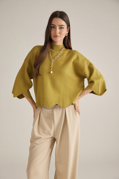 Entro-Solid ¾ sleeve sweater top with a mock neck.