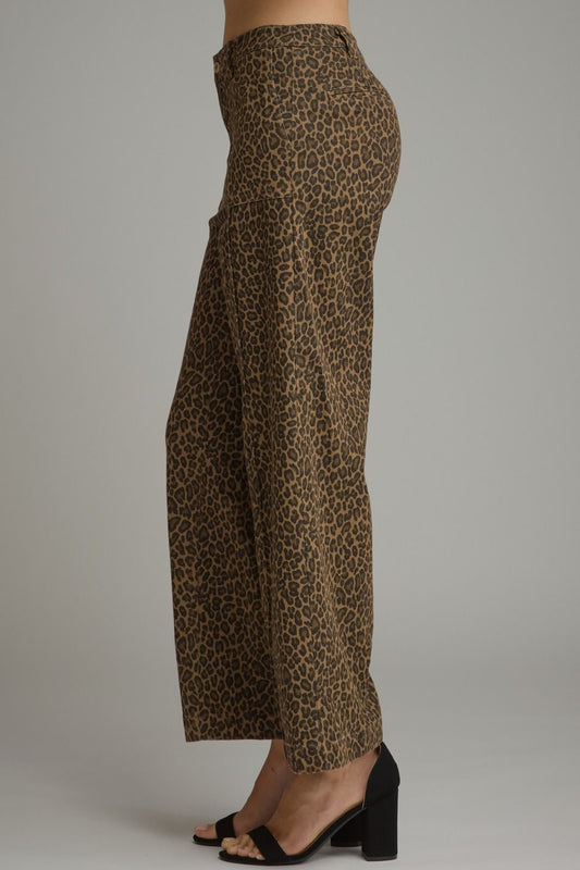 Entro- Animal print wide leg pants with belt loops and zip-fly button front closure. Front patch pockets