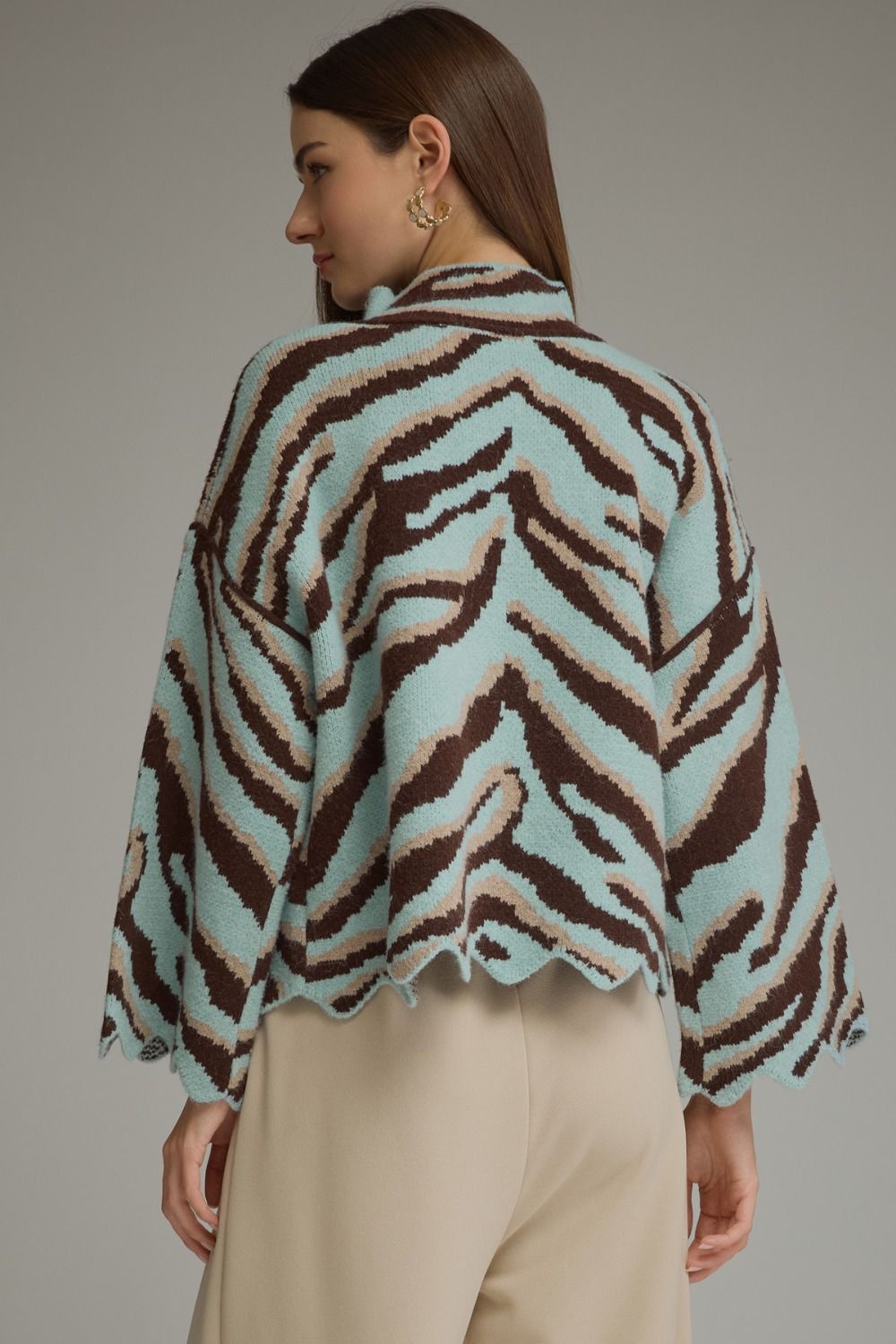 Entro-Animal print long sleeve knit top with mock neckline and scallop trim