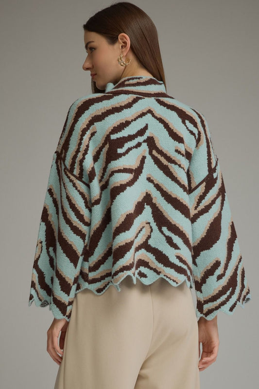 Entro-Animal print long sleeve knit top with mock neckline and scallop trim
