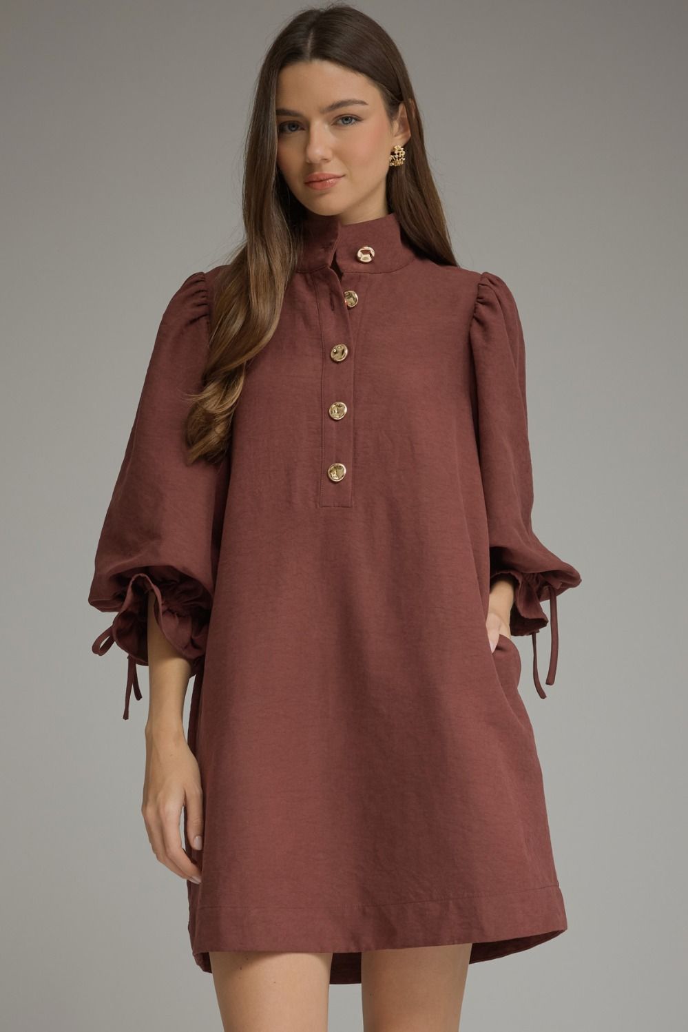 Entro-Solid ¾ balloon sleeve mini dress featuring a stand neck and button closure at front