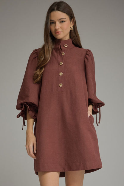 Entro-Solid ¾ balloon sleeve mini dress featuring a stand neck and button closure at front
