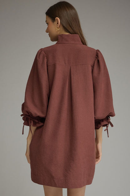 Entro-Solid ¾ balloon sleeve mini dress featuring a stand neck and button closure at front