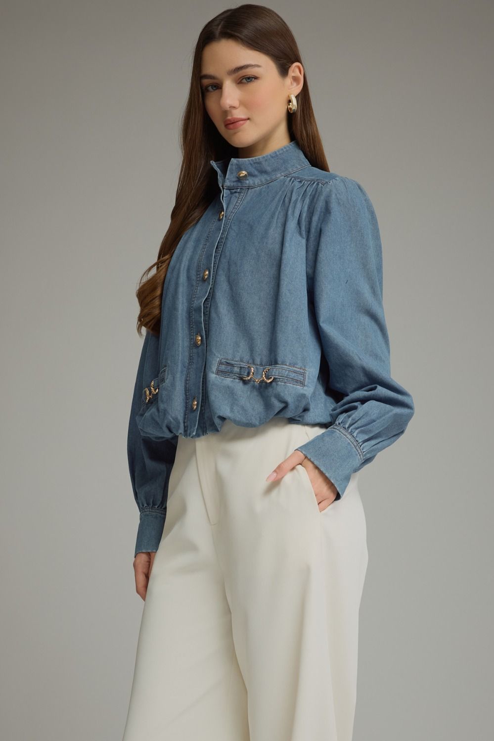 Entro-Solid long sleeve denim top with a high neckline and button closure at front