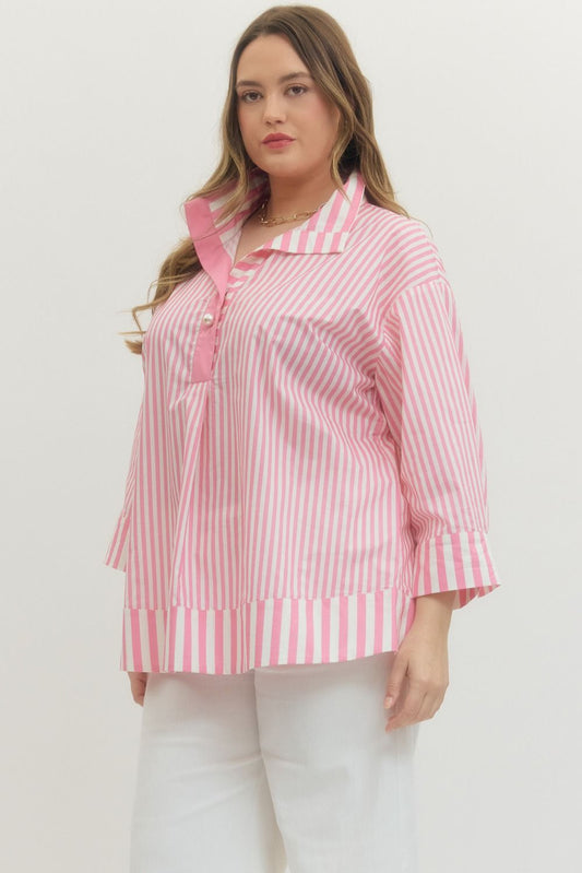Plus Size Entro Stripe print 3/4 sleeve top featuring wide collar and pearl button at hidden placket. Button closures at cuffs. Unlined. Woven. Non-sheer. Lightweight.