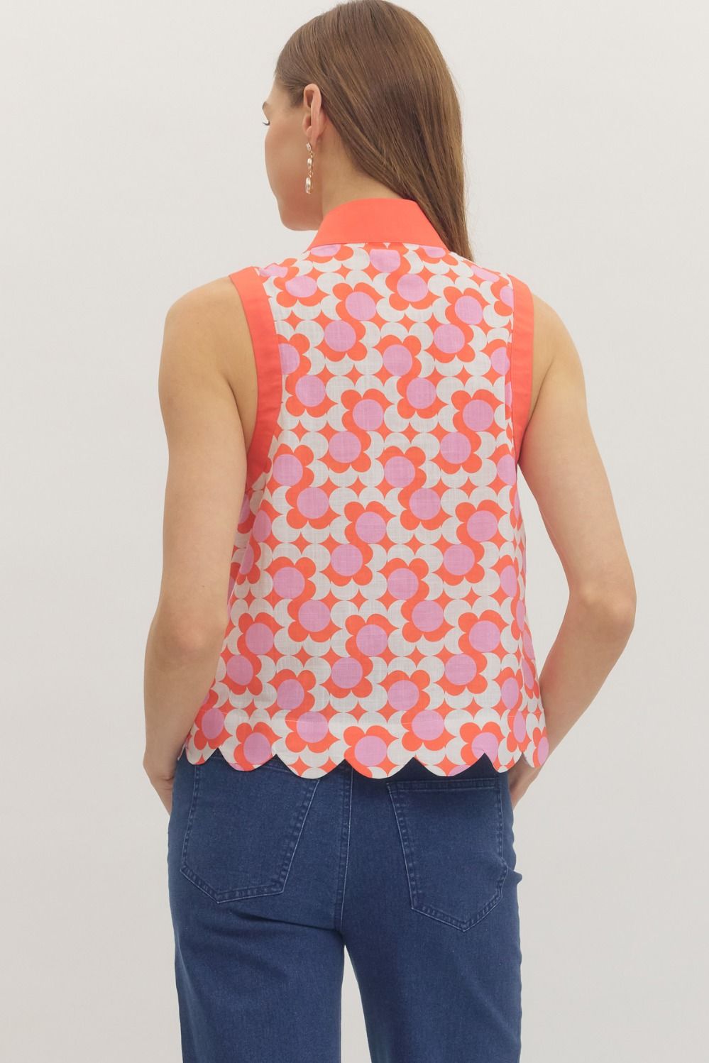Entro-Printed sleeveless top featuring scallop hem detail.