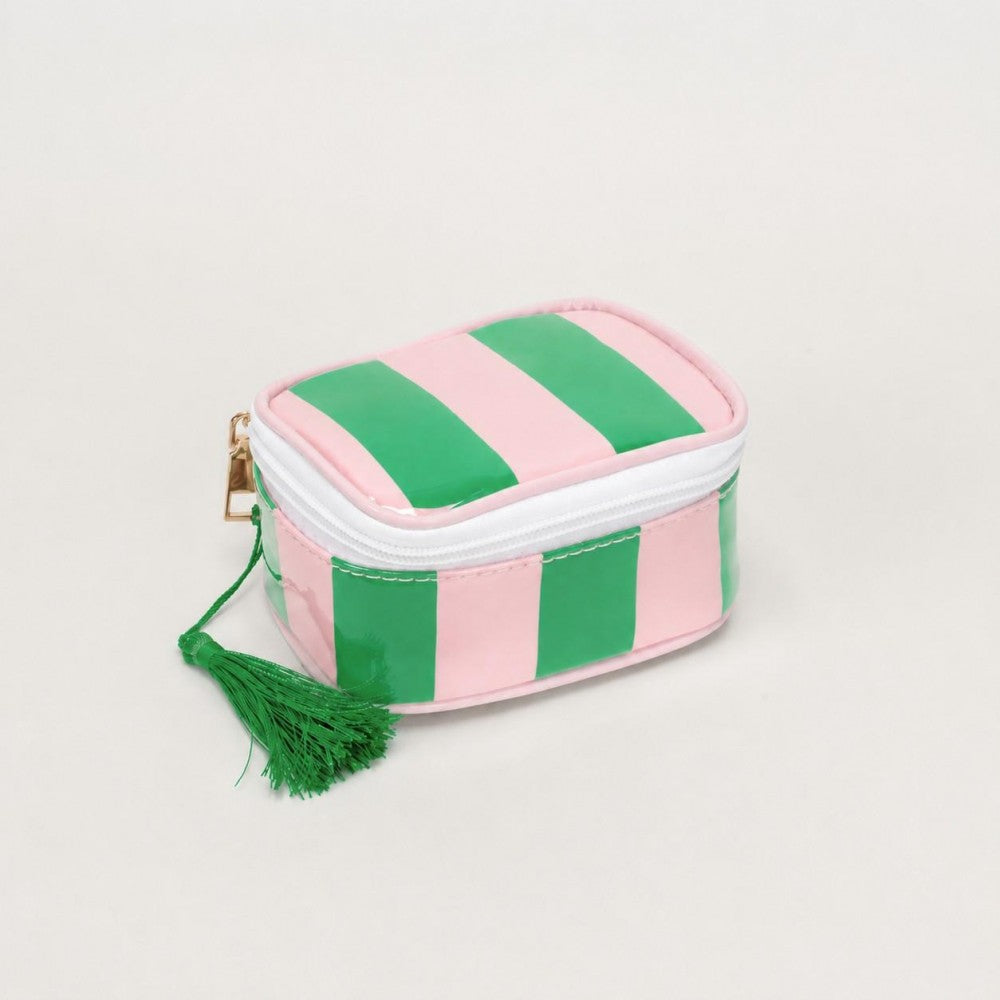 Small striped pouch with a tassel on a light gray background