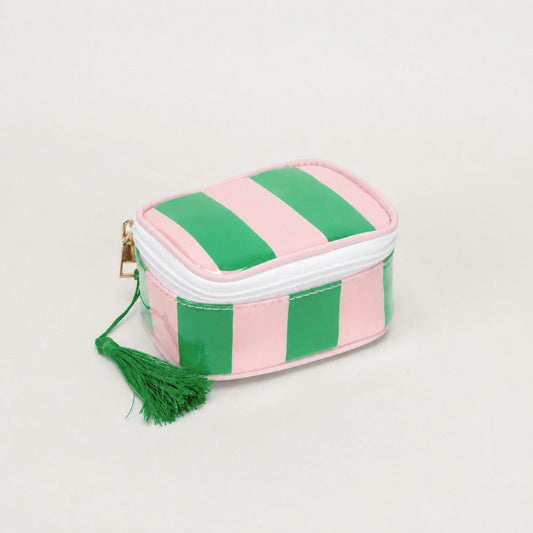 Small striped pouch with a tassel on a light gray background