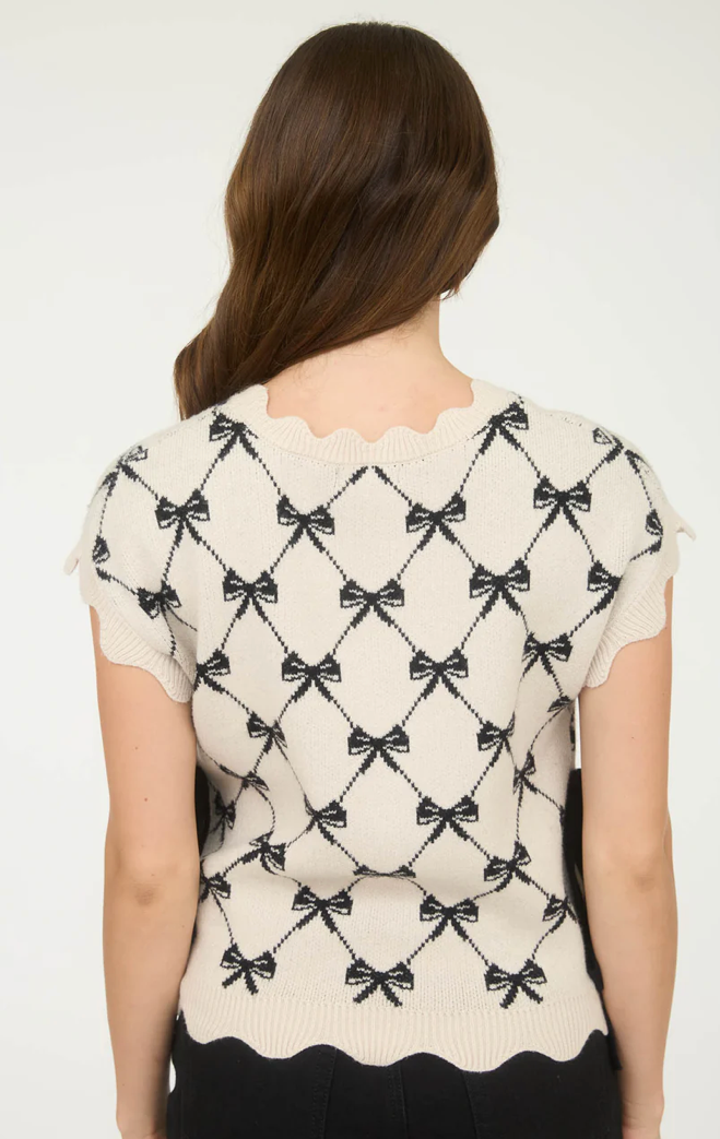 Bow pattern short sleeve side tie knit pullover